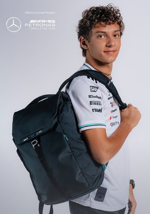 F1 team member wearing the team bag