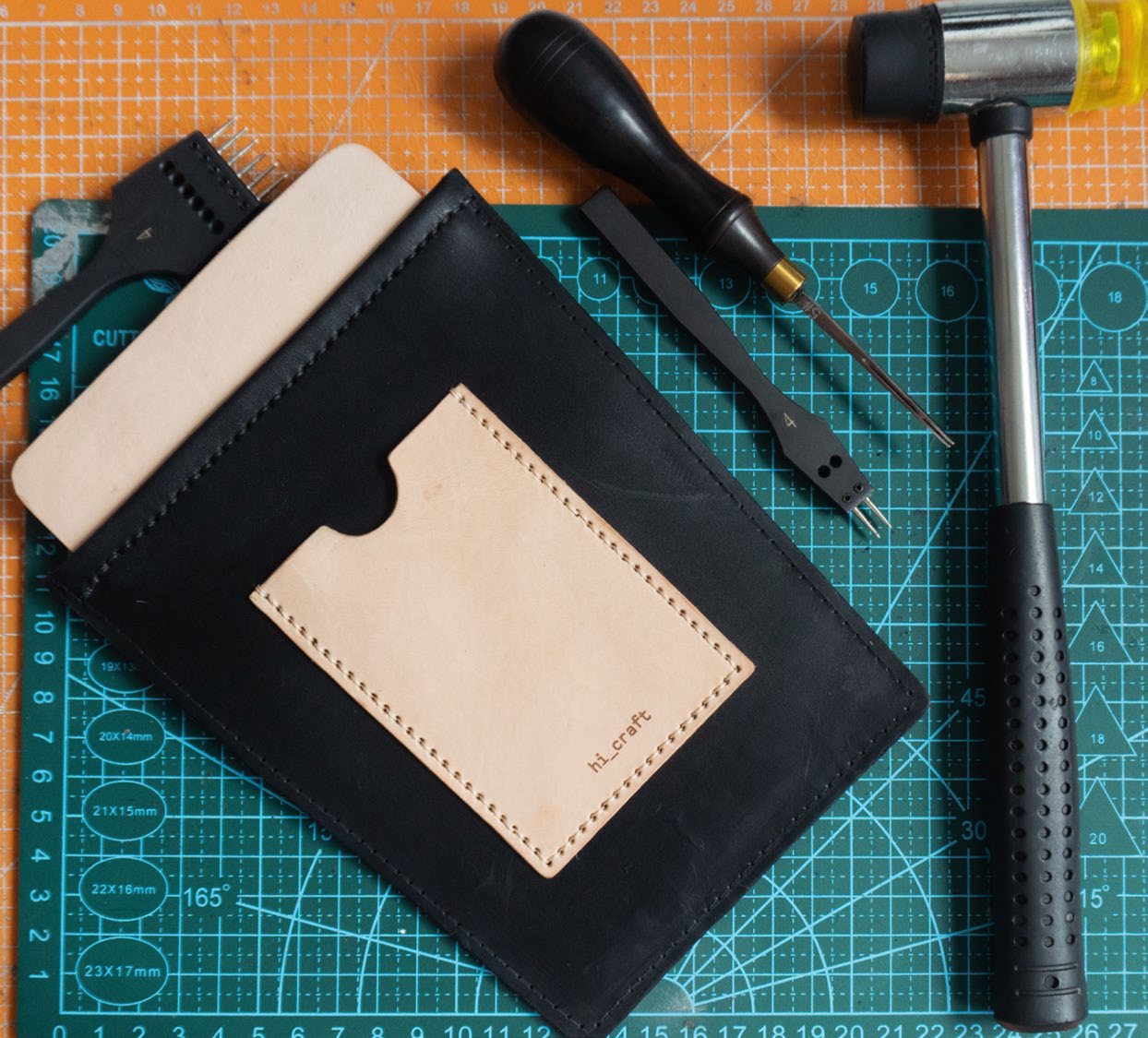 hi_craft leather goods on a cutting mat with tools